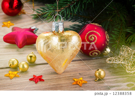golden heart on fir tree golden heart on fir tree 12388358