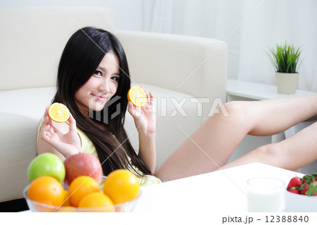 woman with fresh fruits orange woman with fresh fruits orange 12388840