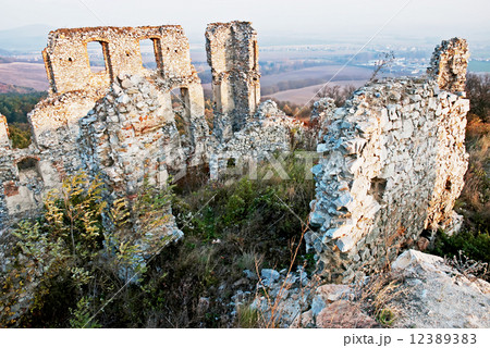 Old wall of castle with a windows 12389383