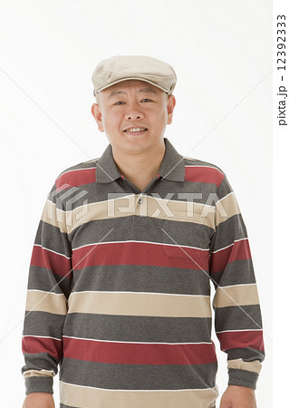 ハンチング帽を被った40代男性の写真素材
