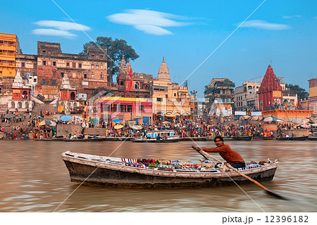 Morning at holy ghats of Varanasi, India 12396182