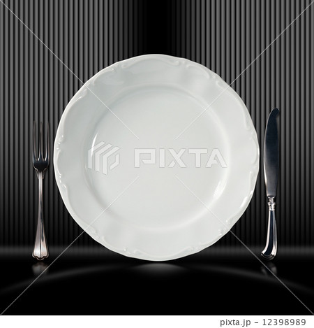Empty White Plate with Cutlery Empty White Plate with Cutlery 12398989