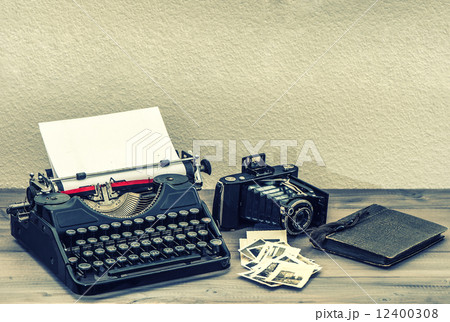 Antique typewriter and vintage photo camera Antique typewriter and vintage photo camera 12400308