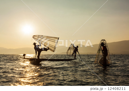 Burmese fisherman at Inle lake, Myanmar Burmese fisherman at Inle lake, Myanmar 12408211