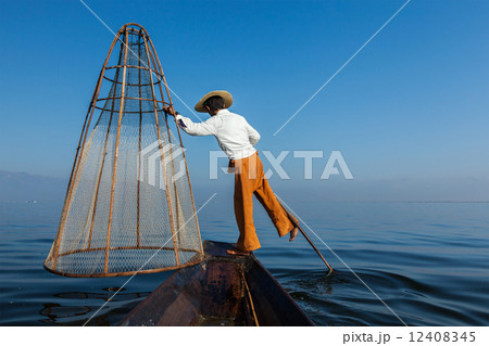 Burmese fisherman at Inle lake, Myanmar Burmese fisherman at Inle lake, Myanmar 12408345