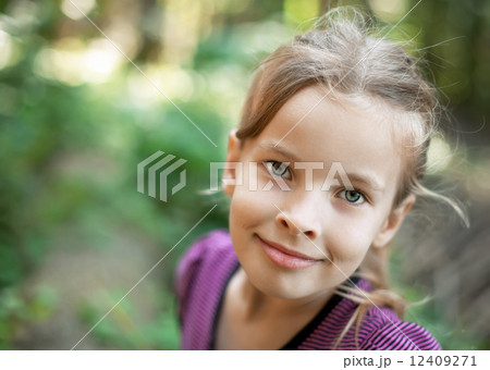 Smiling cute little girl 12409271
