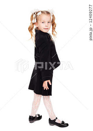 nice little girl in a school uniform nice little girl in a school uniform 12409277