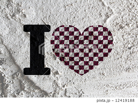 Love checkered flag sign heart symbol on Cement wall texture ba Love checkered flag sign heart symbol on Cement wall texture ba 12419188