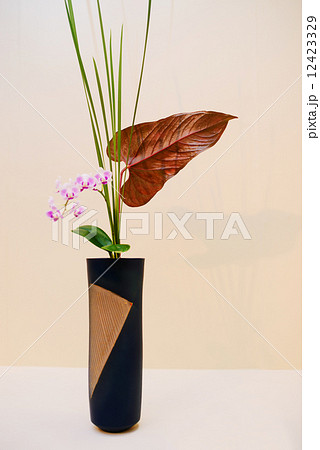 Japanese ikebana. Flower arrangement  12423329