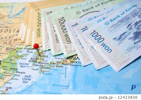 Korean bank notes with pin on map Korean bank notes with pin on map 12423830