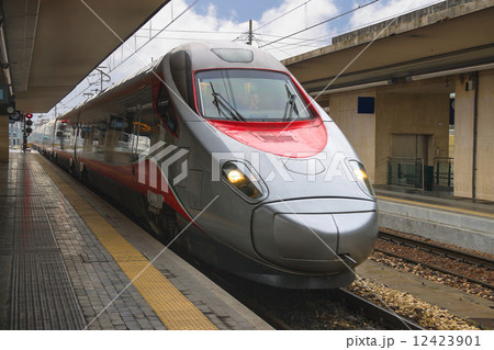 The train stops near the platform station in Italy 12423901