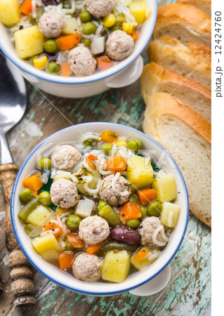 Meatball soup with vegetables 12424760