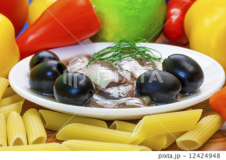 Anchovy fillets with macaroni olives and vegetables Anchovy fillets with macaroni olives and vegetables 12424948