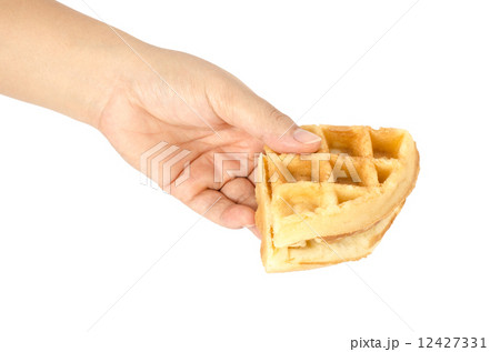 Hand holding waffle Hand holding waffle 12427331