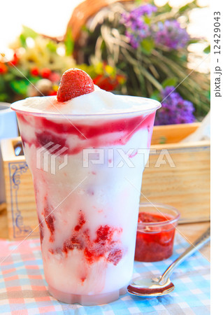 smoothy strawberry milk ready for eating on decoration table top smoothy strawberry milk ready for eating on decoration table top 12429043