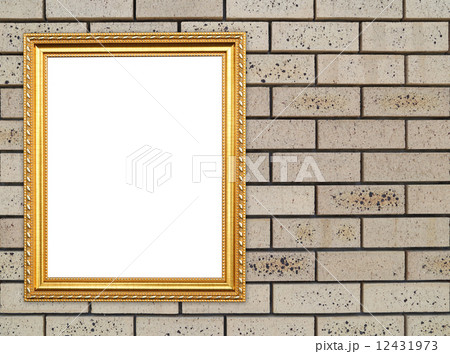 blank golden frame on brick stone wall 12431973