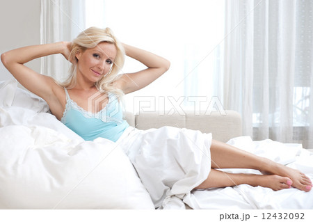 attractive woman waking up attractive woman waking up 12432092