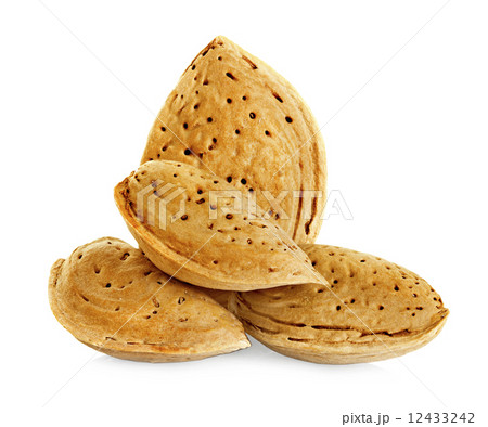 Almond nut in shell isolated on a white background. Almond nut in shell isolated on a white background. 12433242