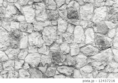 Seamless background texture of white stone wall 12437216