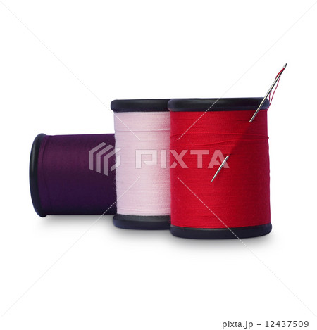 colorful sewing Threads isolated on white background 12437509