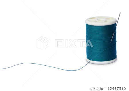 Sewing thread and needle on white Sewing thread and needle on white 12437510