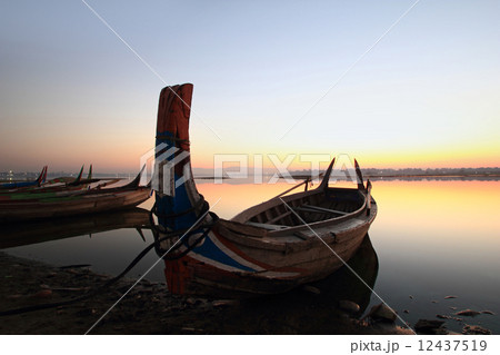 beautiful morning of marina at U-Bein bridge beautiful morning of marina at U-Bein bridge 12437519
