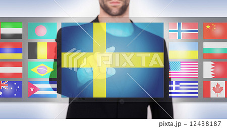Hand pushing on a touch screen interface Hand pushing on a touch screen interface 12438187