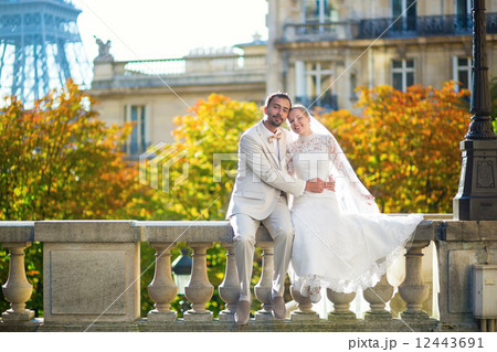 Happy just married couple in Paris 12443691