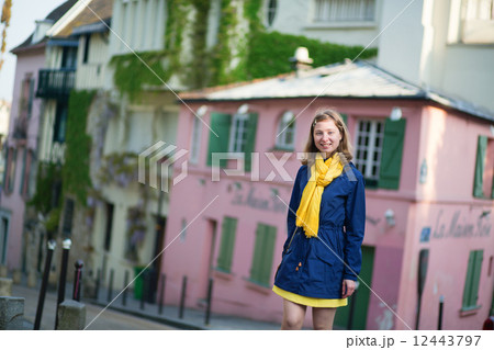 Happy young girl on a street of Montmartre 12443797