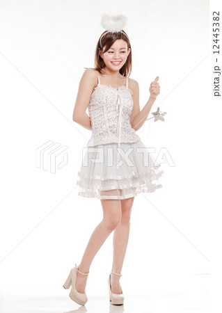 Chinese Woman in Angel Costume with wand Chinese Woman in Angel Costume with wand 12445382