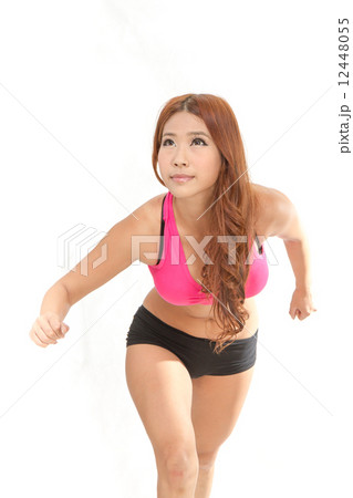 Beautiful Asian woman exercising Beautiful Asian woman exercising 12448055