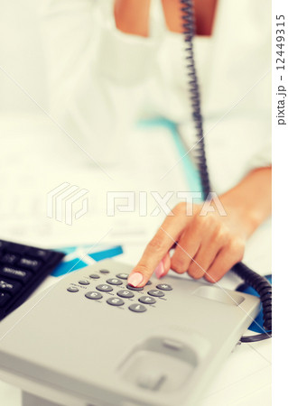 businesswoman with phone calling 12449315