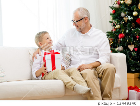 smiling grandfather and grandson at home smiling grandfather and grandson at home 12449340