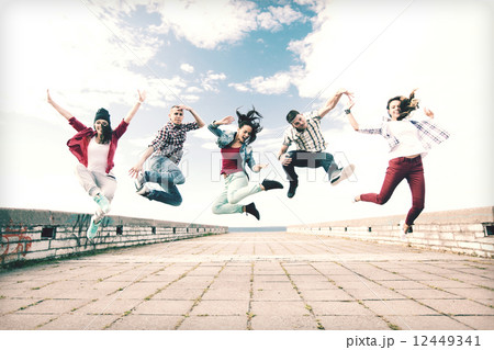group of teenagers jumping group of teenagers jumping 12449341