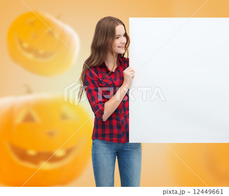 smiling teenage girl with white board 12449661