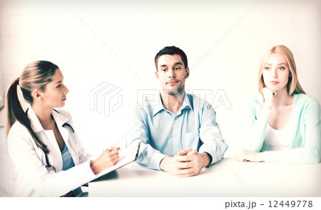 doctor with patients in cabinet 12449778