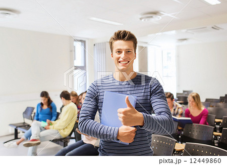 group of smiling students in lecture hall group of smiling students in lecture hall 12449860