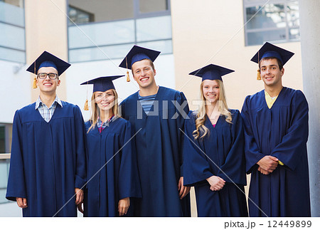 group of smiling students in mortarboards 12449899
