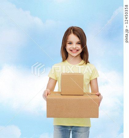 smiling little girl in white blank t-shirt 12450358