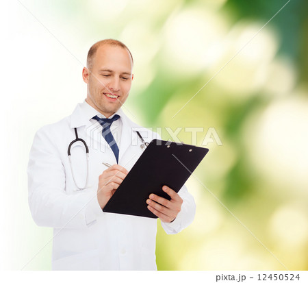 smiling male doctor with clipboard and stethoscope 12450524
