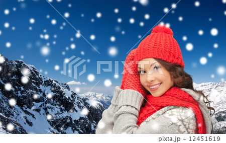smiling young woman in winter clothes smiling young woman in winter clothes 12451619