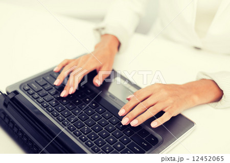 businesswoman using her laptop computer businesswoman using her laptop computer 12452065