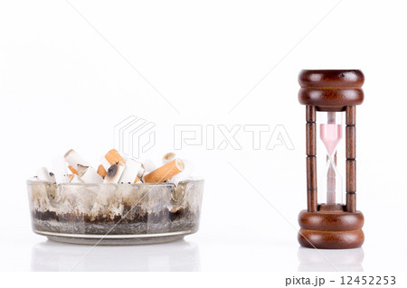 ashtray and cigarettes on white background 12452253