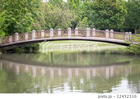 stone bridge in beautiful garden stone bridge in beautiful garden 12452310