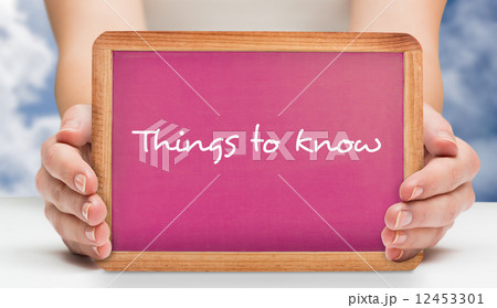 Composite image of females hands showing pink board 12453301