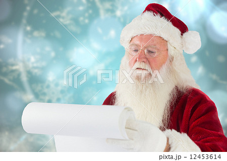 Composite image of santa claus checking his list Composite image of santa claus checking his list 12453614