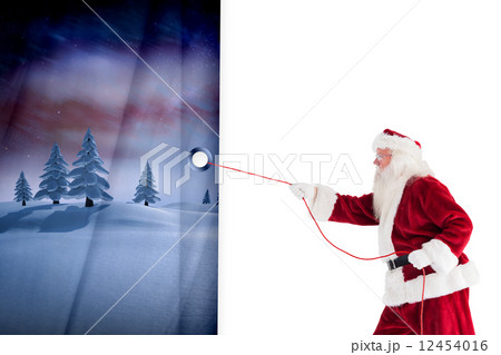 Santa claus pulling a rope Santa claus pulling a rope 12454016