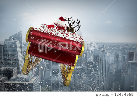 Composite image of santa flying his sleigh Composite image of santa flying his sleigh 12454969