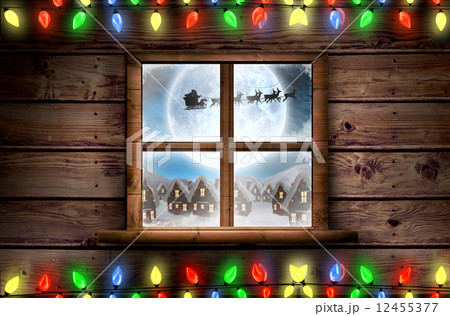 Composite image of decorative lights hanging in a shape 12455377