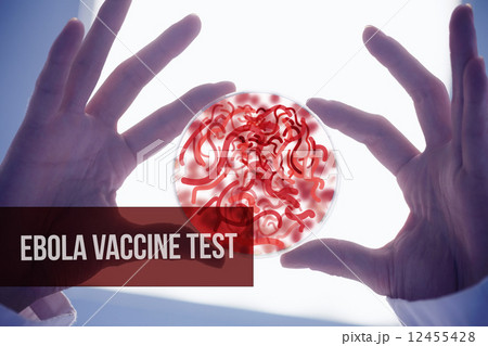 Scientists hands holding petri dish of germs 12455428
